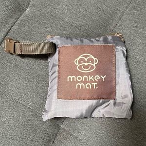 Monkey Mat picnic travel blanket with weighted corners. 5’ x 5’ square.